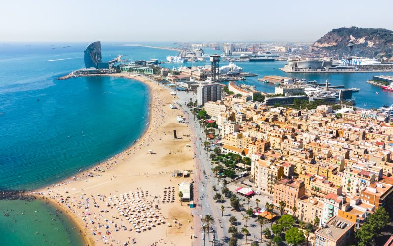 Aerial view made with a drone of la Barceloneta beach and residential district, situated in Barcelona - Spain